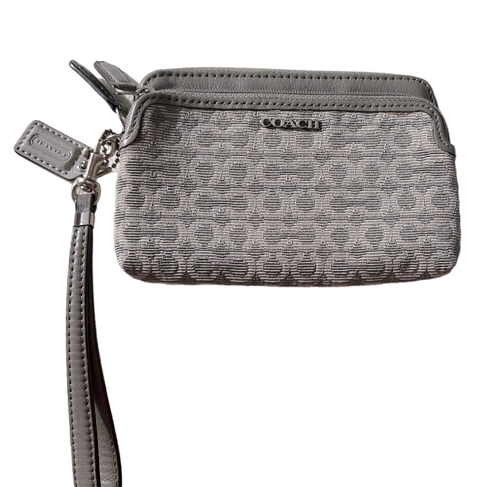 Signature Coach Grey fabric wristlet, two pocket, corner zip. Silver hardware.